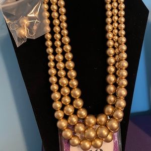 Golden pearl necklace set.  Fashion jewelry.